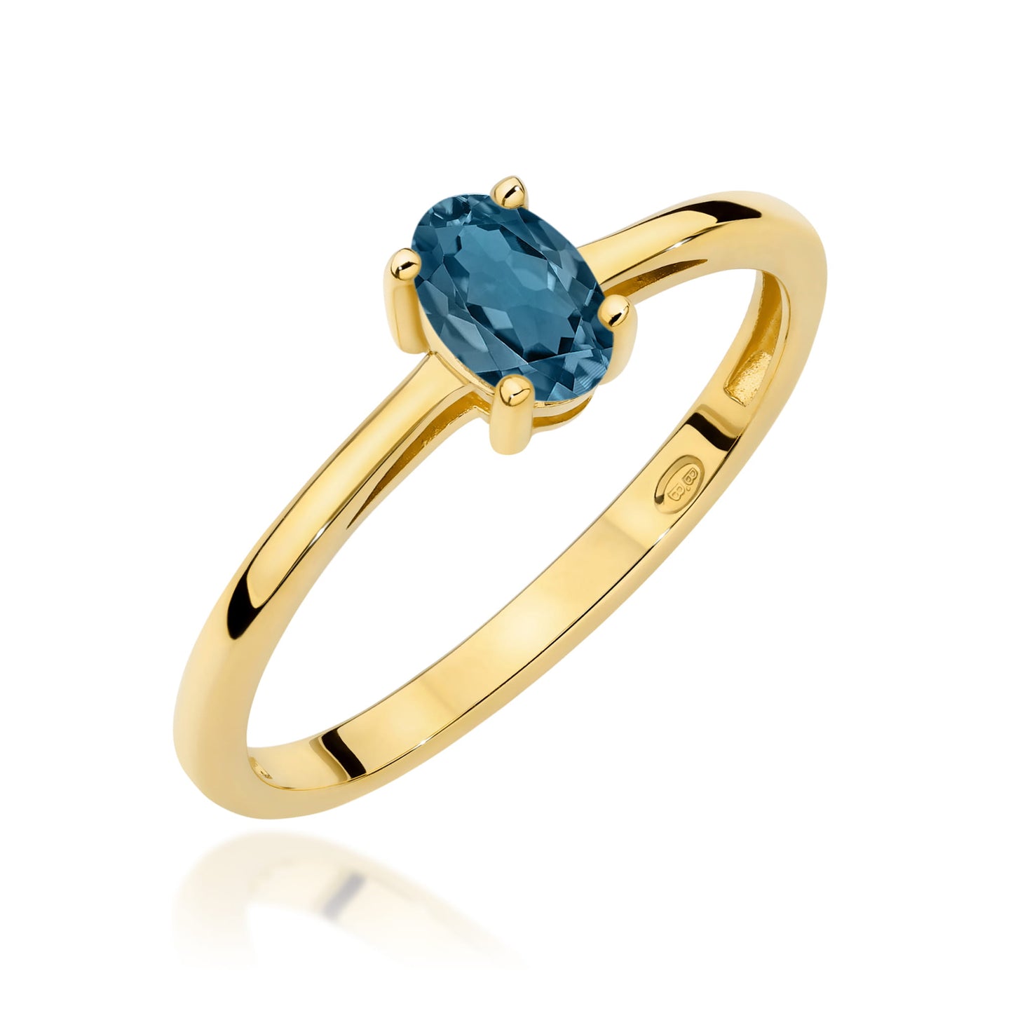 złoty pierścionek z owalnym topaz blue swiss
