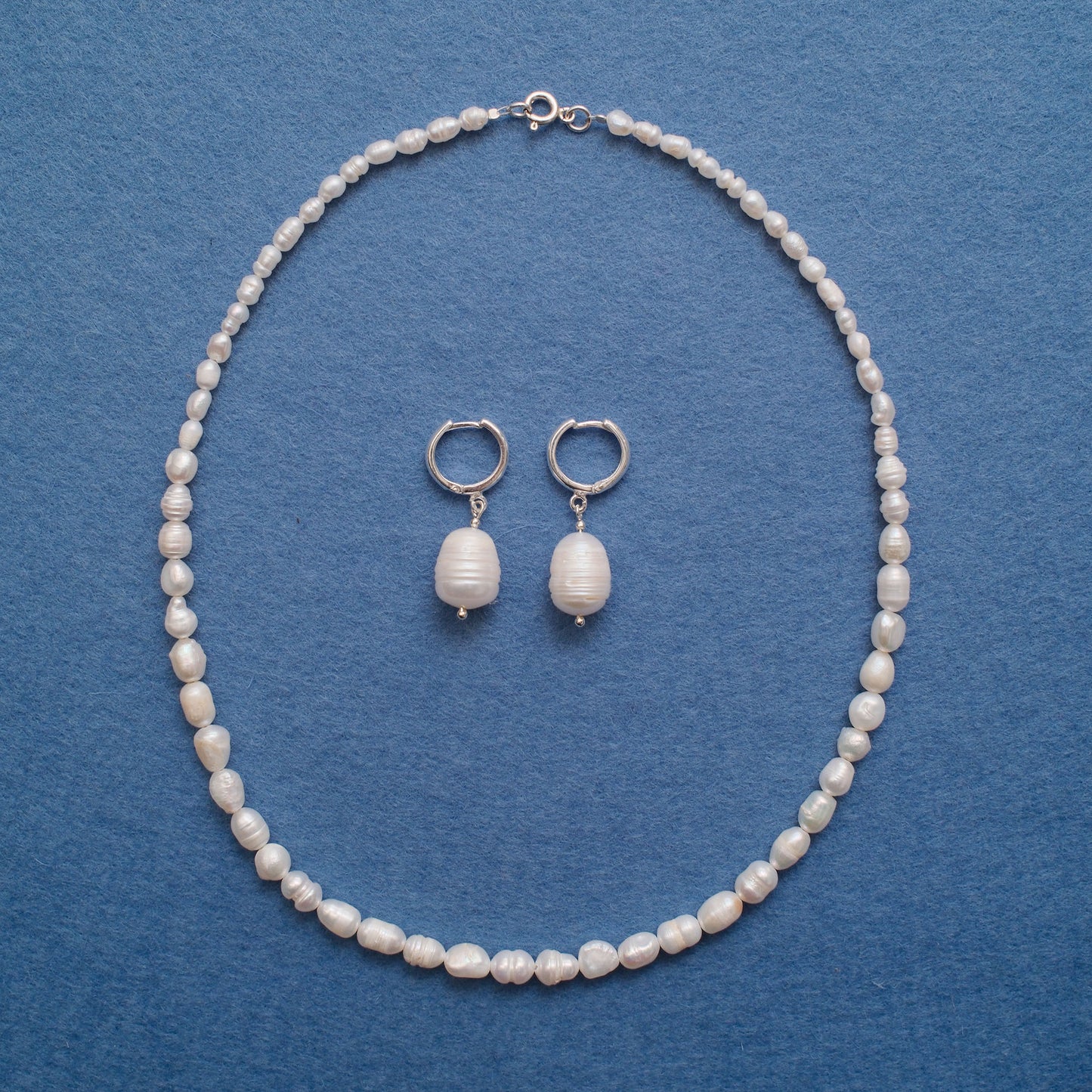 Wiszące kolczyki z perłą